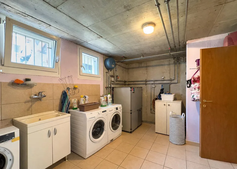 Casa bifamiliare con grande giardino a Morbio Inferiore