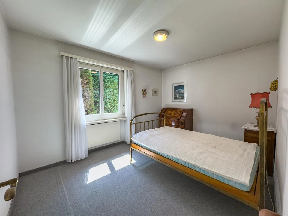 Villa con giardino e vista aperta sul golfo di Lugano a Carona