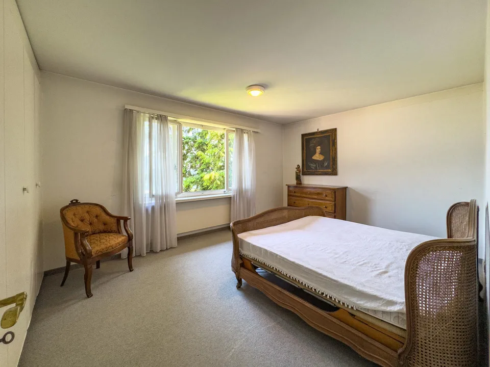 Villa con giardino e vista aperta sul golfo di Lugano a Carona