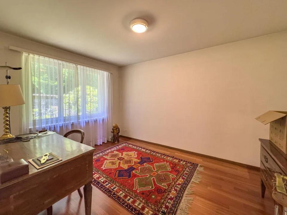 Villa con giardino e vista aperta sul golfo di Lugano a Carona