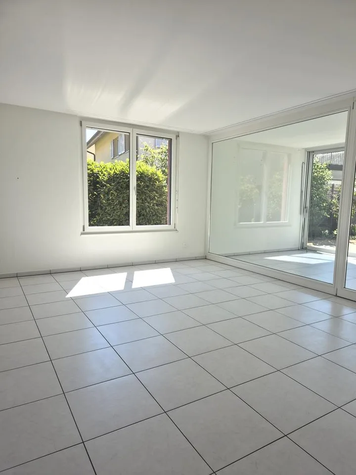 Appartement 3.5 pièces familial avec jardin et serre