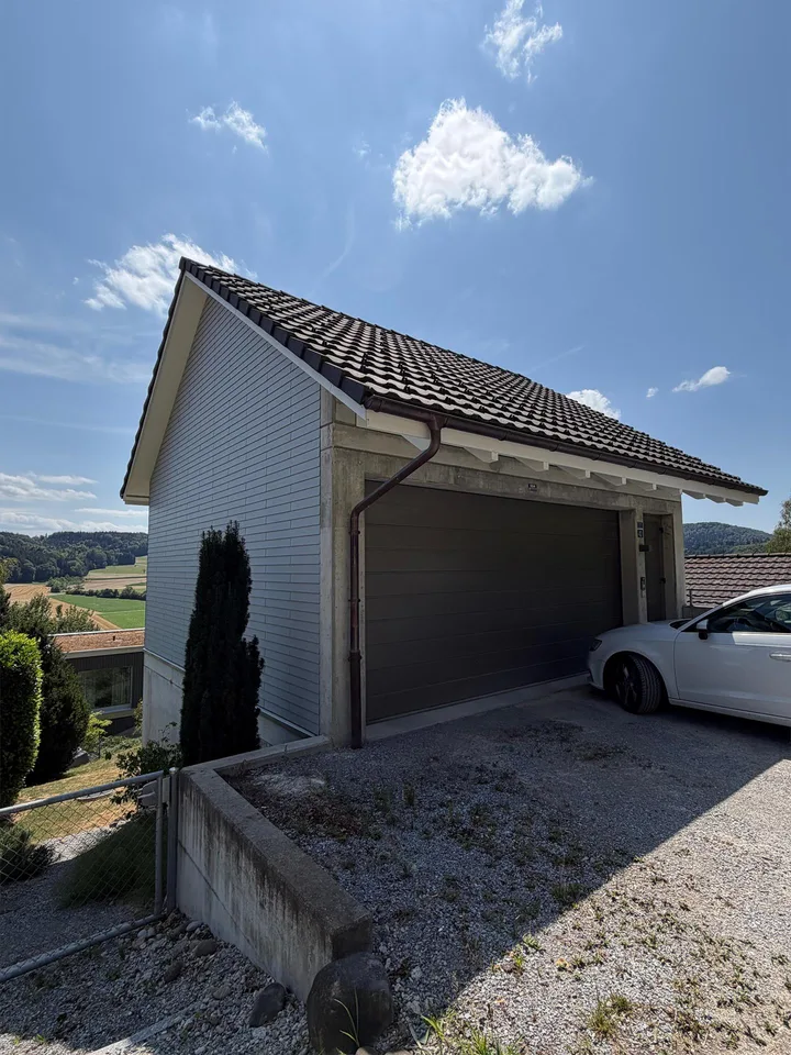 5.5 Zimmer Haus mit Hanglage
