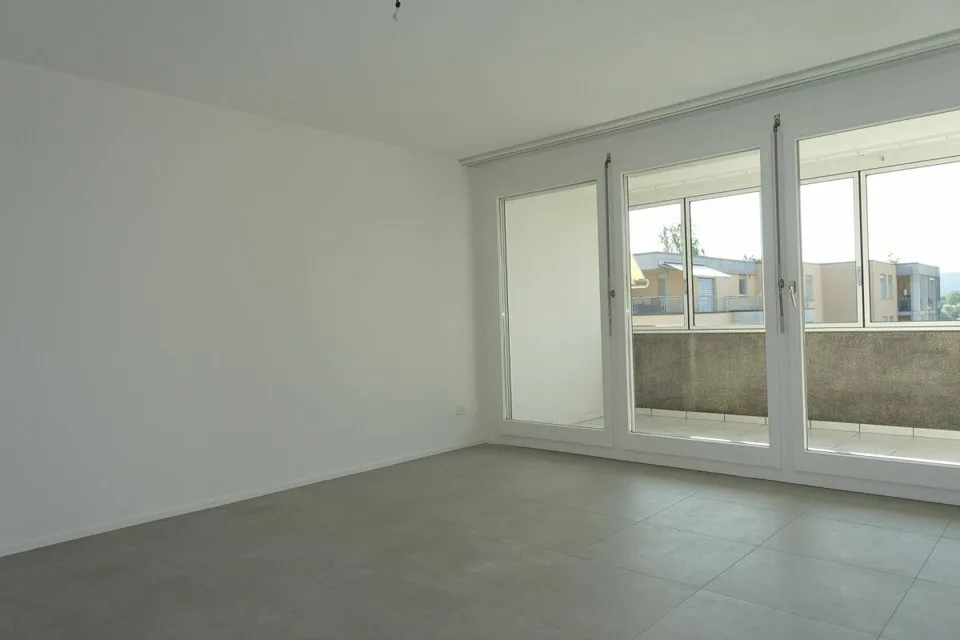 Renovierte 3.5 Zi-Eigentumswohnung mit Balkon und Einstellhallenplatz