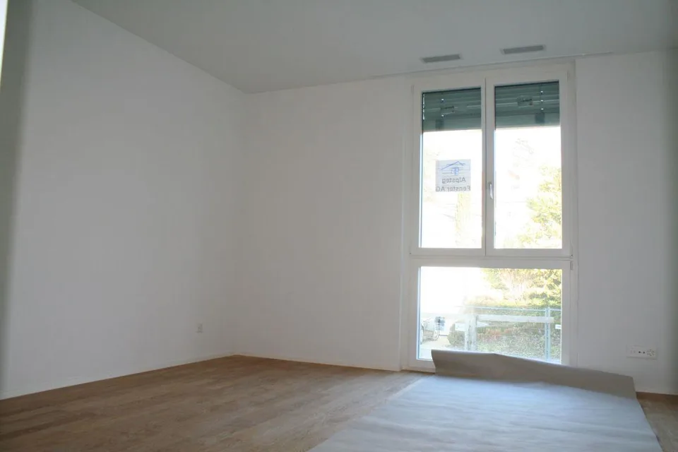 MODERNE PARTERREWOHNUNG MIT UMSCHWUNG
