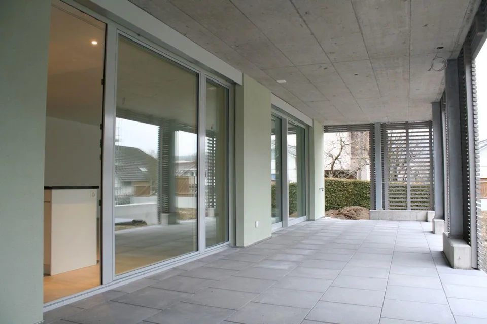 MODERNE PARTERREWOHNUNG MIT UMSCHWUNG