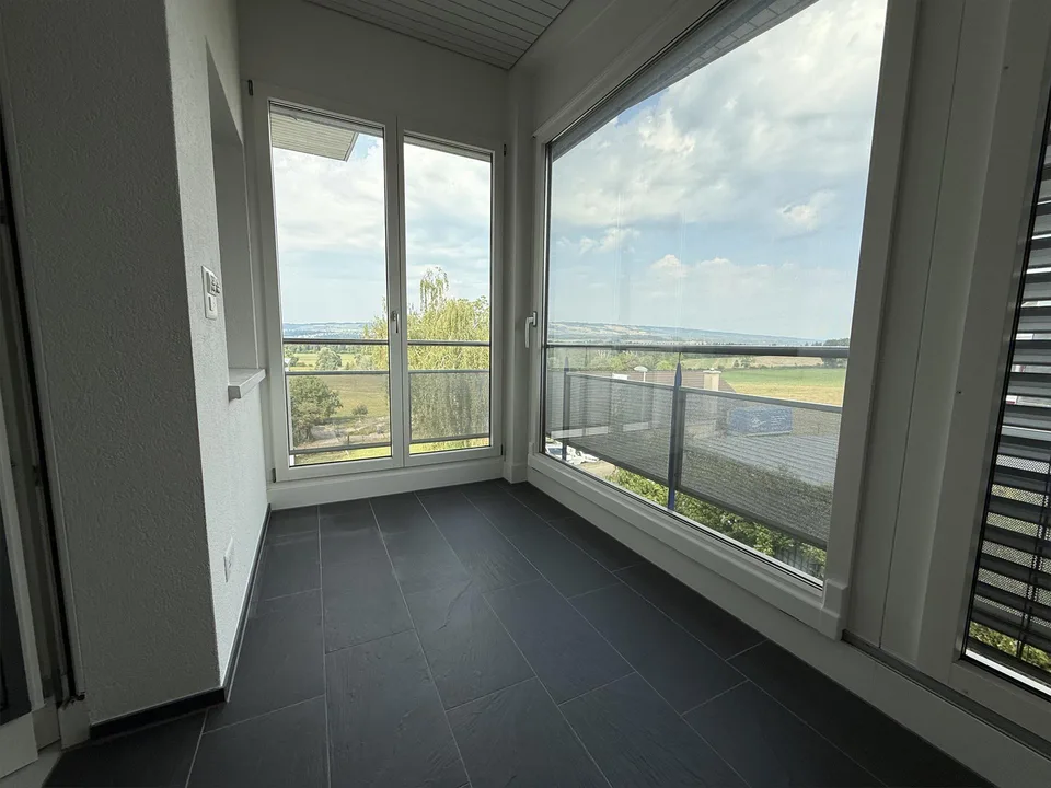 Sonnige 4 1/2 Zimmer Attika Wohnung mit Panorama-Aussicht