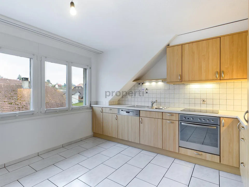 Lichtdurchflutete Dachwohnung mit sonnigem Südbalkon