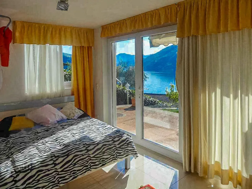 Villa a schiera con splendida vista lago a Bissone