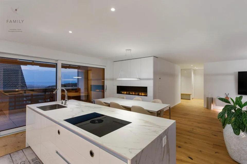 Living like in a single-family house - Exclusive 4 1/2 room garden apartment with beautiful lake view, plenty of privacy and high-quality construction