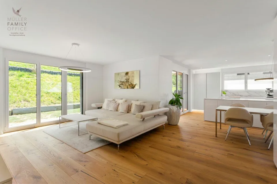 Living like in a single-family house - Exclusive 4 1/2 room garden apartment with beautiful lake view, plenty of privacy and high-quality construction