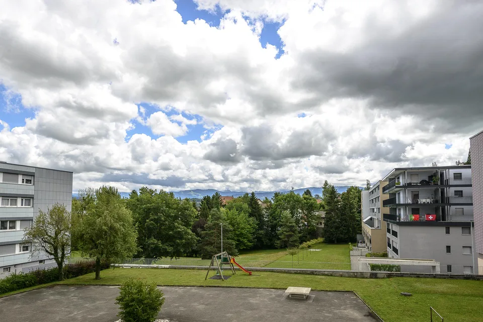 Quartier verdoyant à proximité des commerces
