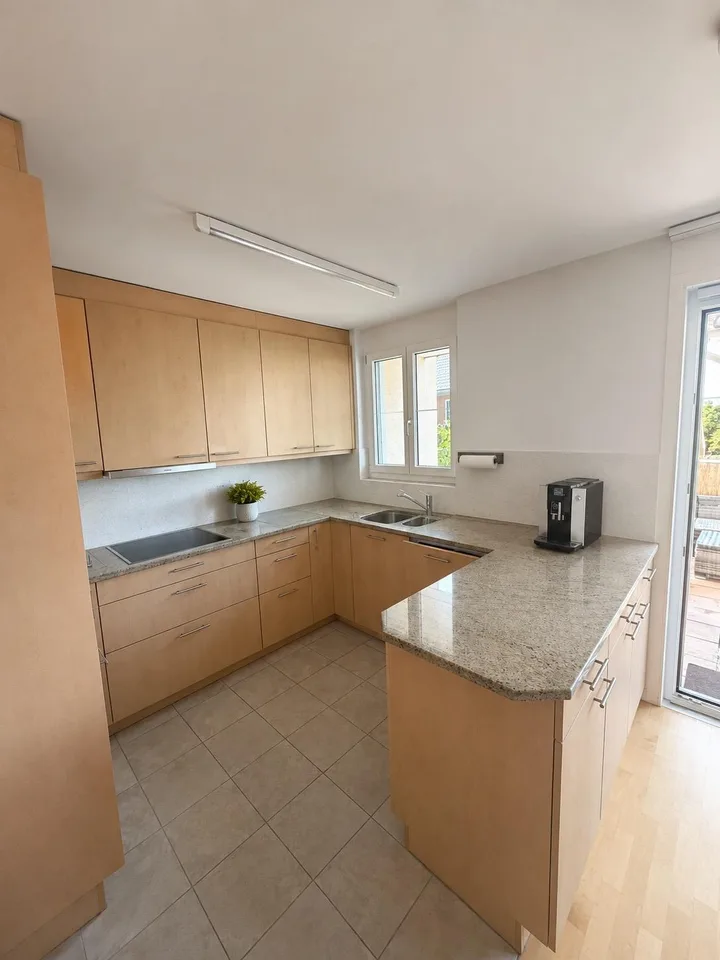 Traumhafte 3.5-Zimmer-Gartenwohnung mit privater Oase & Studio
