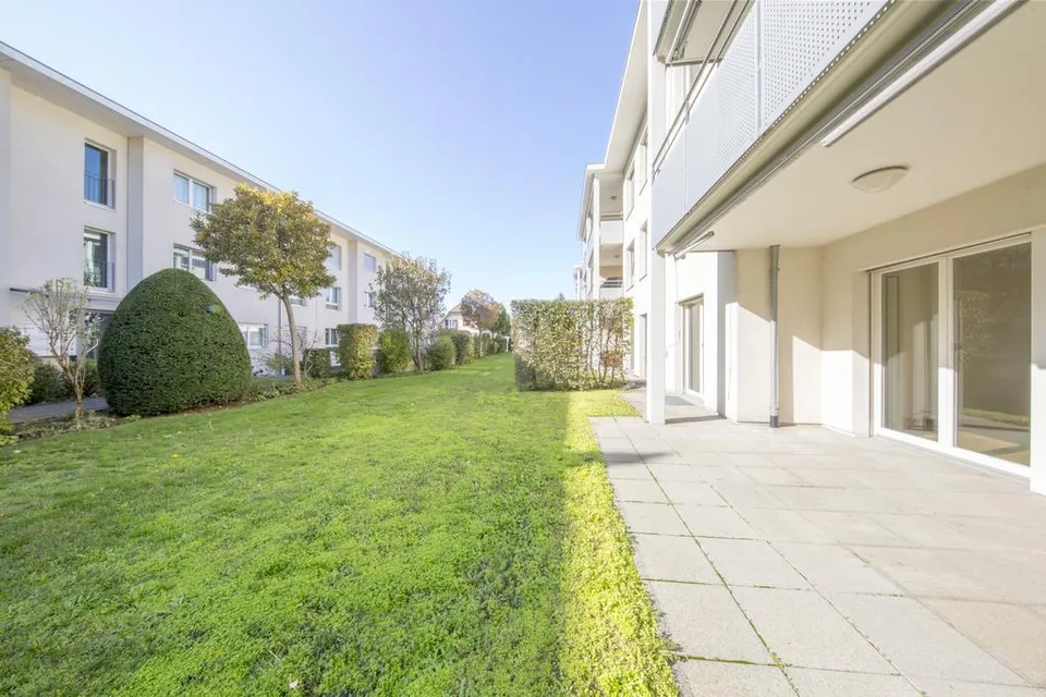 Bright apartment with covered garden seating area