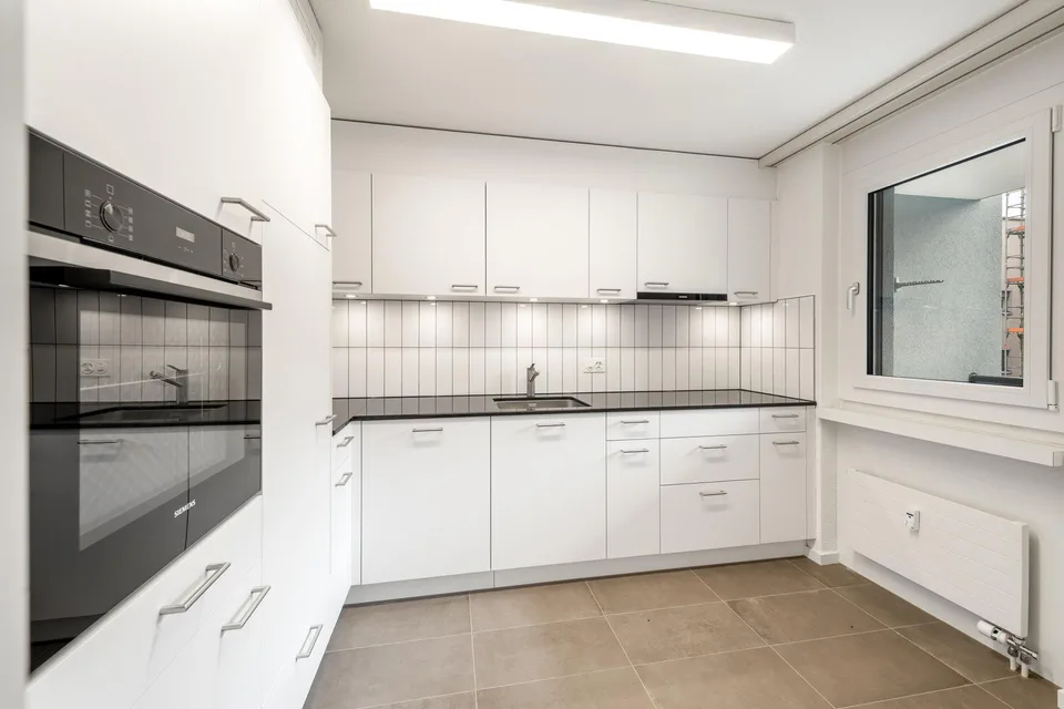 Entre Reussufer et vie de ville - appartement de 5,5 pièces rénové.