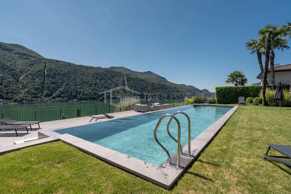 ELEGANTE APPARTAMENTO DI 4 LOCALI CON GIARDINO E VISTA LAGO