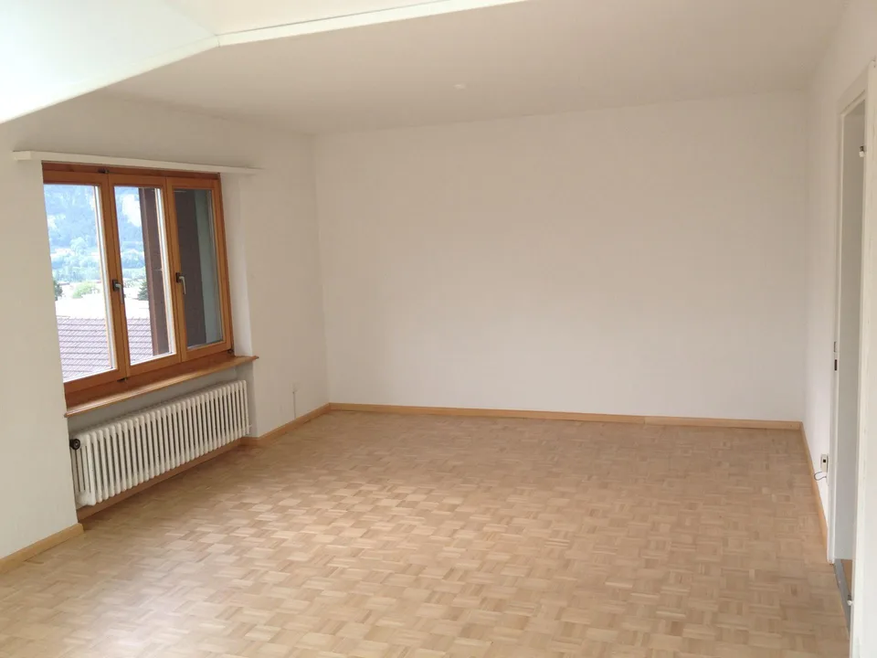Sonnige Dachwohnung an bester Lage