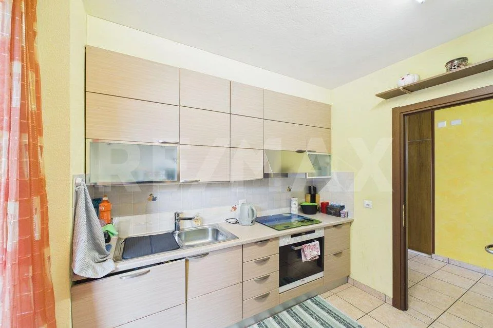 Appartamento di 4½ locali con giardino in posizione soleggiata
