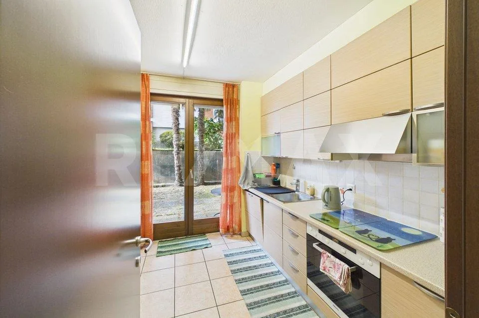 Appartamento di 4½ locali con giardino in posizione soleggiata