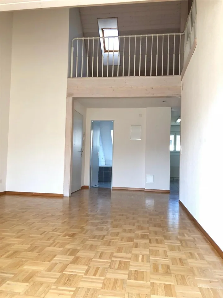Appartement mansardé avec galerie