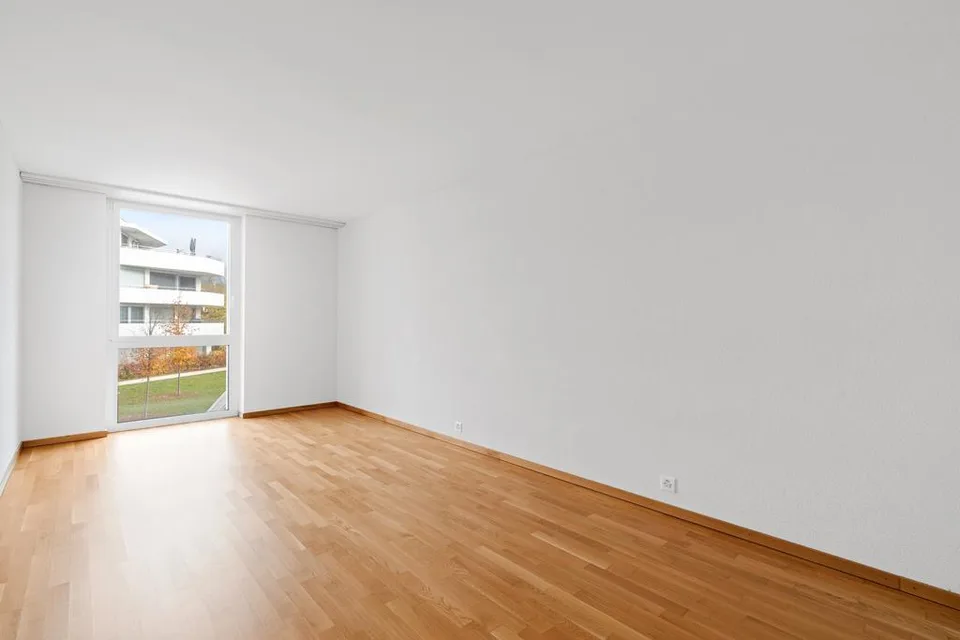 5 pièces au 1er étage, au sein d'un quartier MINERGIE familiale
