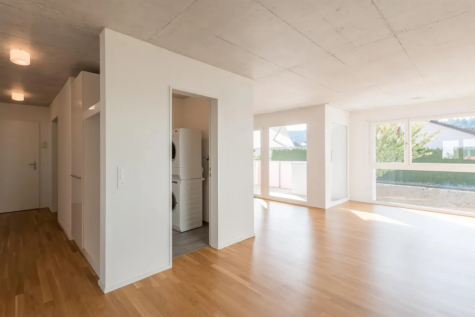 Living space with open kitchen seeks new stories!