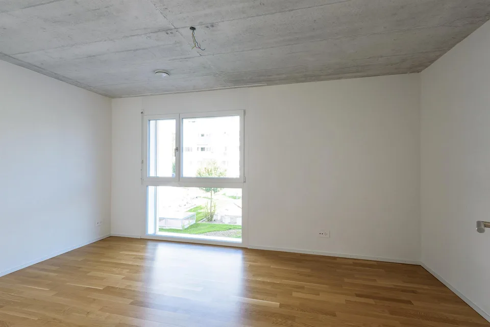 Living space with open kitchen seeks new stories!