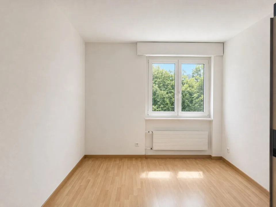 Appartement ensoleillé de 5,5 pièces dans un quartier familial