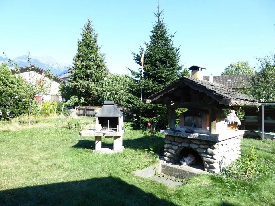 Detached two-family house with garages and spacious surroundings