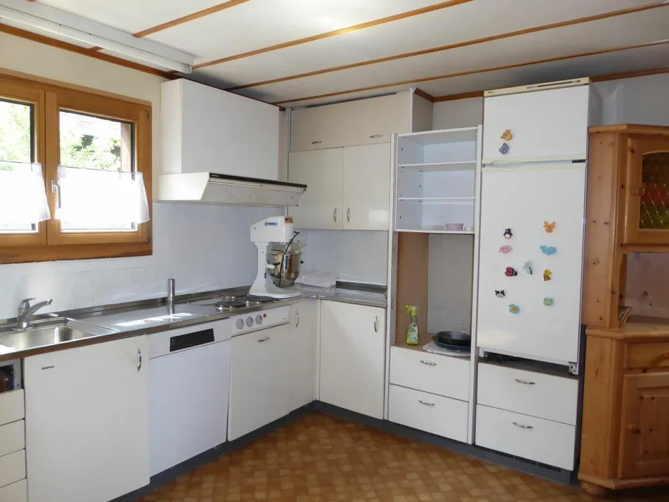 Detached two-family house with garages and spacious surroundings