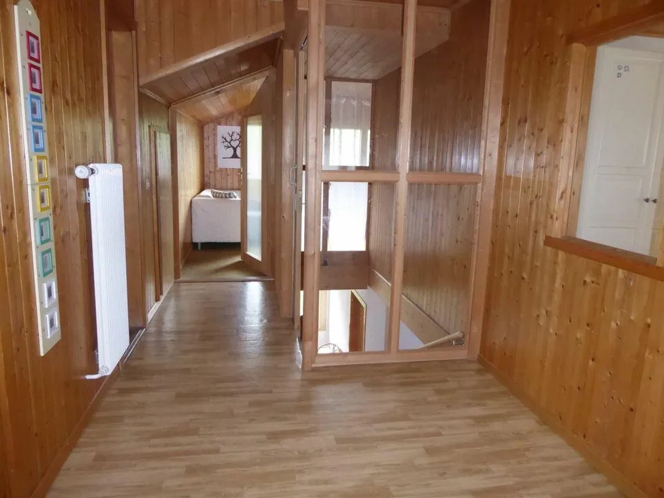 Detached two-family house with garages and spacious surroundings