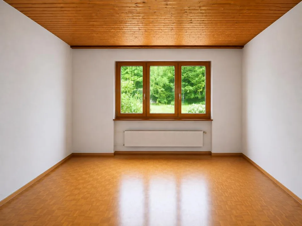 Detached two-family house with garages and spacious surroundings
