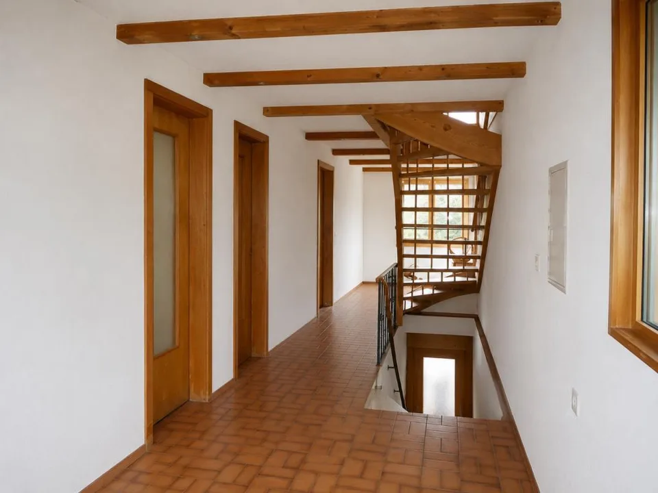 Detached two-family house with garages and spacious surroundings