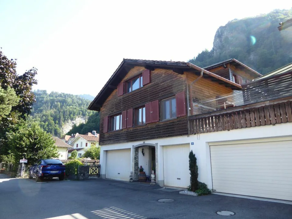 Detached two-family house with garages and spacious surroundings