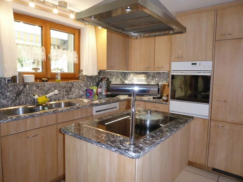 Detached two-family house with garages and spacious surroundings