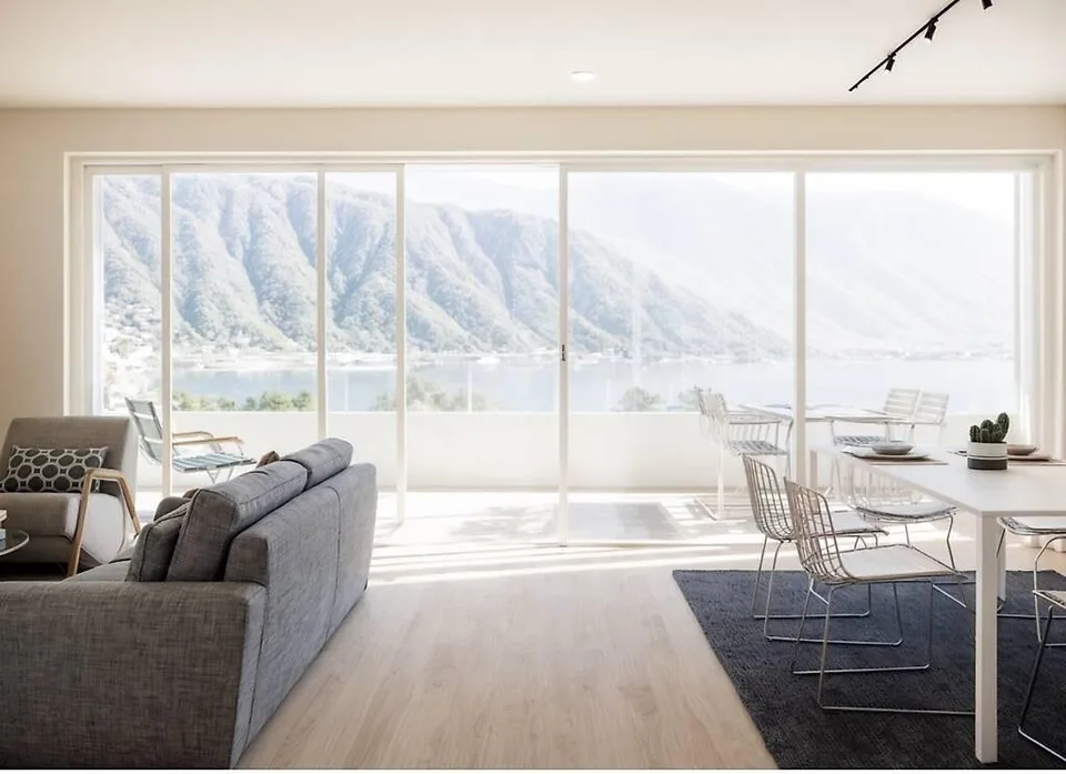 NEUE MODERNE 4.5 ZIMMER WOHNUNG MIT GARTEN UND SEEVIEW IN MELIDE