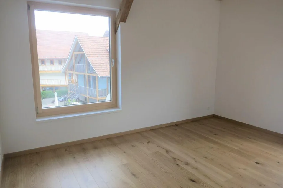 Einzigartiges Wohnambiente - 2½ Zimmer mit Holzelementen und Loggia
