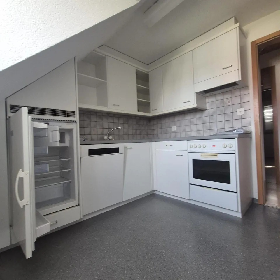 Charmante 2.5-Zimmer-Wohnung mit Dachbalkon im Zentrum von Mörschwl