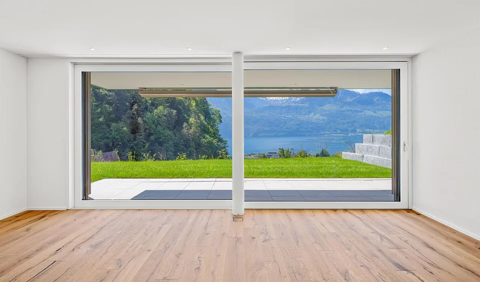 Appartement de jardin neuf avec vue imprenable sur le lac