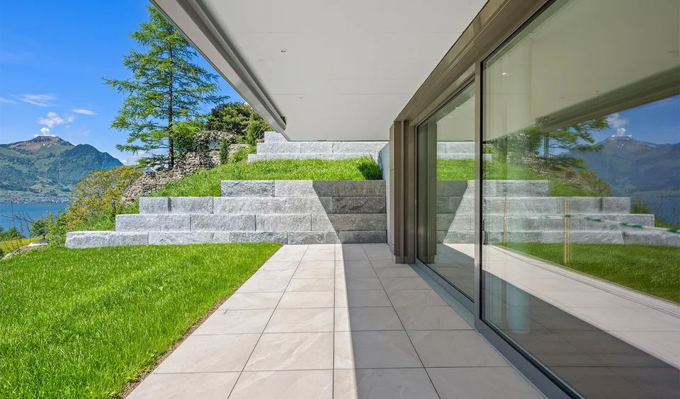 Appartement de jardin neuf avec vue imprenable sur le lac