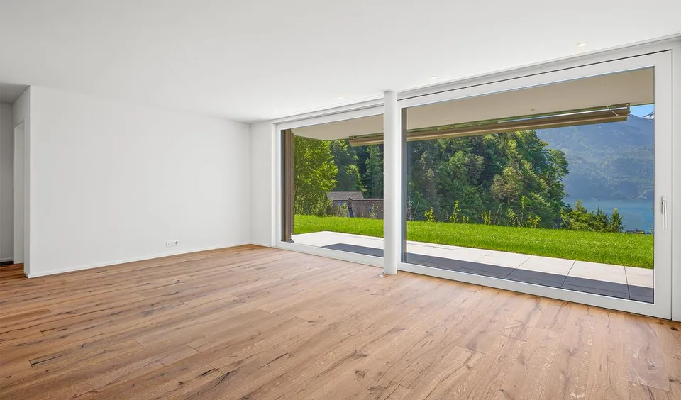 Appartement de jardin neuf avec vue imprenable sur le lac