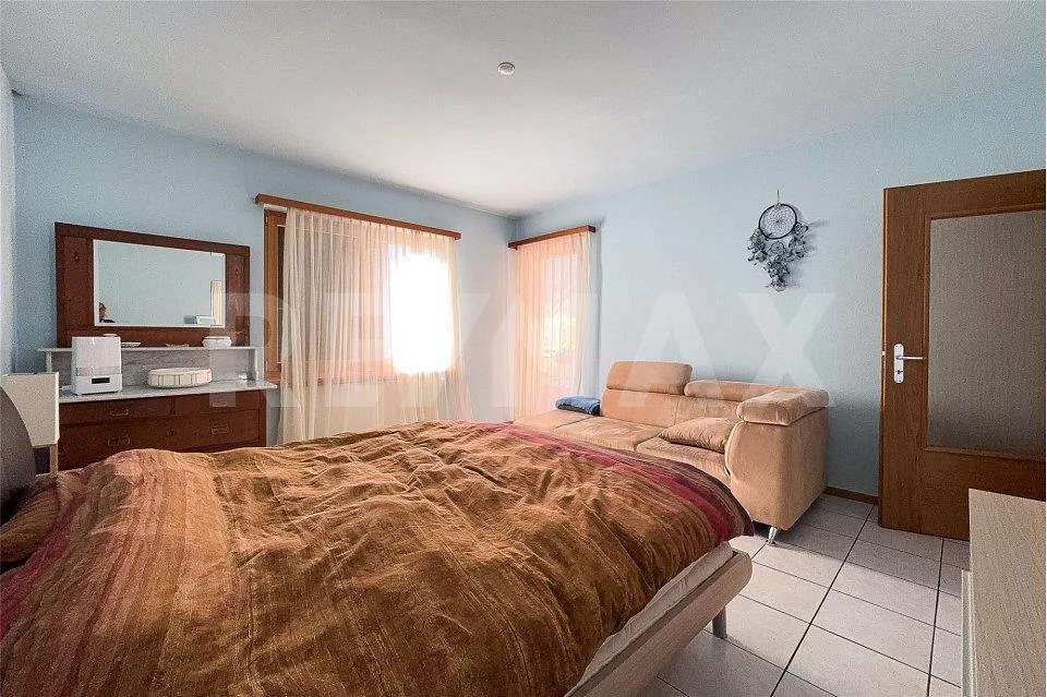 Casa con 2 appartamenti indipendenti e giardino – Foto 8 von 13