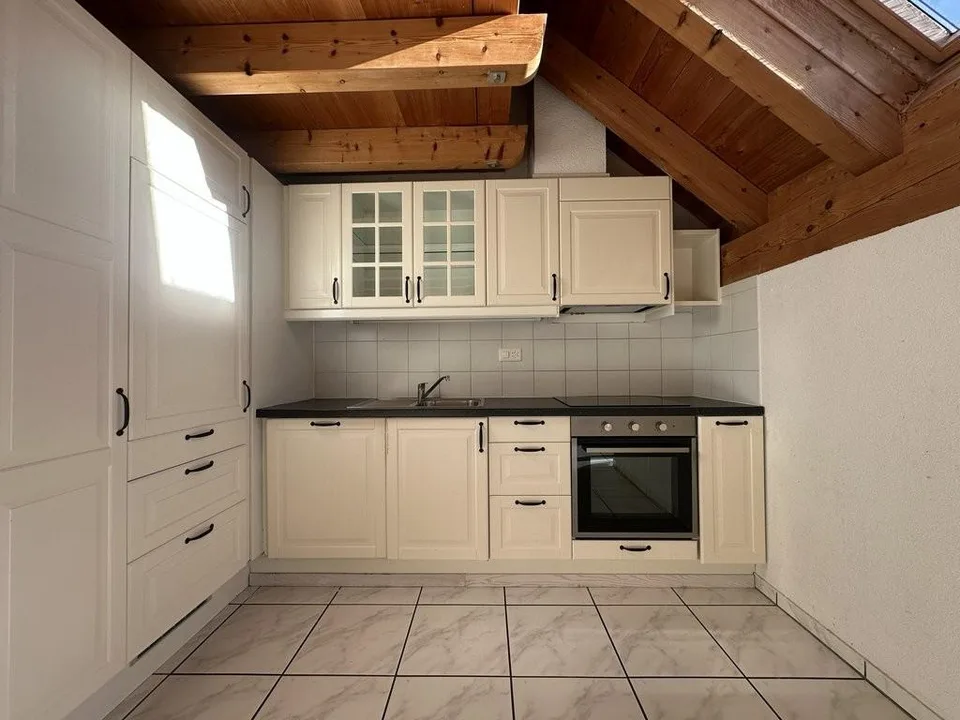 Einzigartige Dachstockwohnung mit Blick ins Grüne