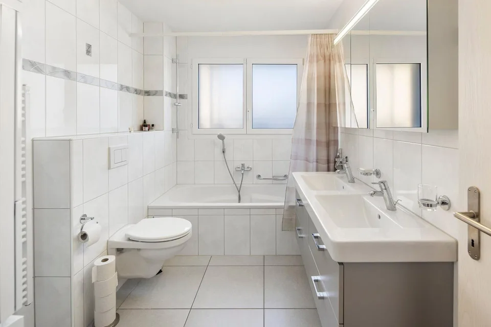 Moderne Familienwohnung mit traumhafter Gartenoase – photo 9 of 13
