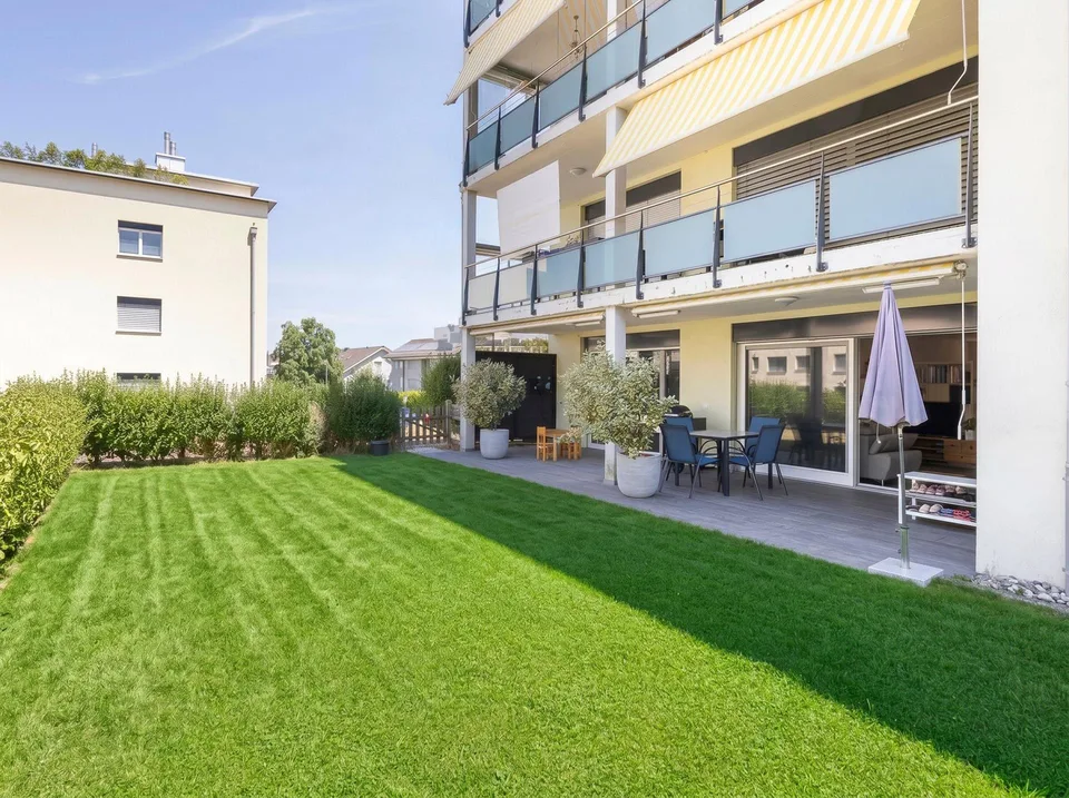 Moderne Familienwohnung mit traumhafter Gartenoase – photo 12 of 13