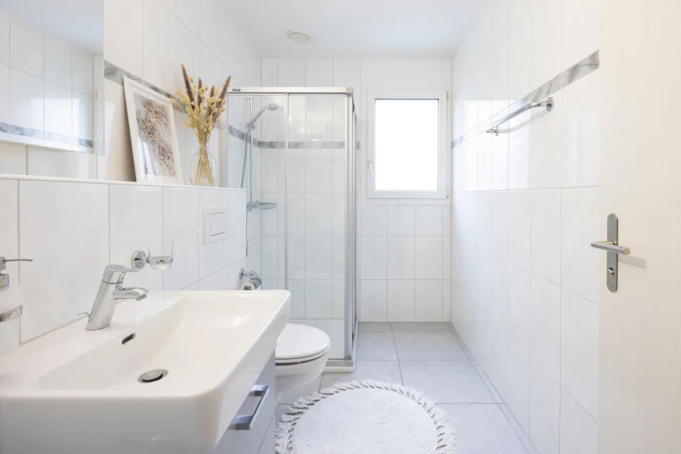 Moderne Familienwohnung mit traumhafter Gartenoase – photo 8 of 13