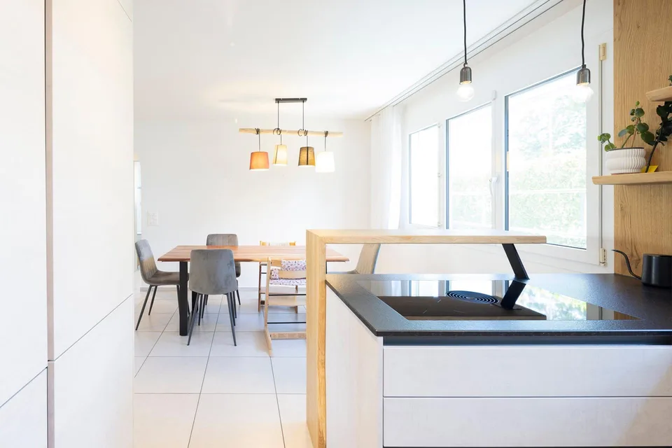 Moderne Familienwohnung mit traumhafter Gartenoase – photo 4 of 13