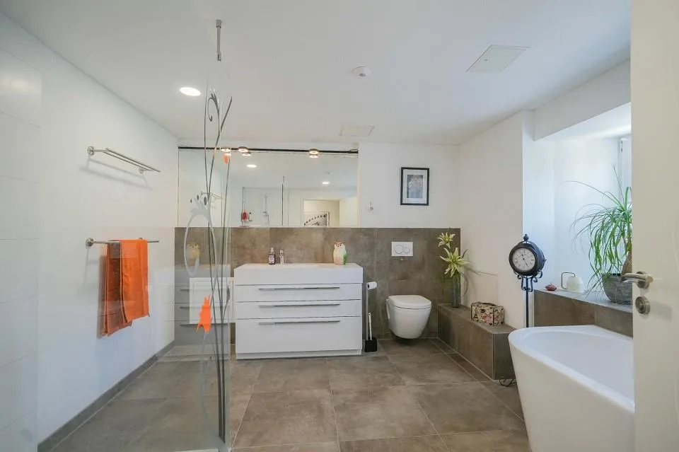 Appartement-maisonnette 4,5 pièces avec grande pièce polyvalente – photo 12 sur 13