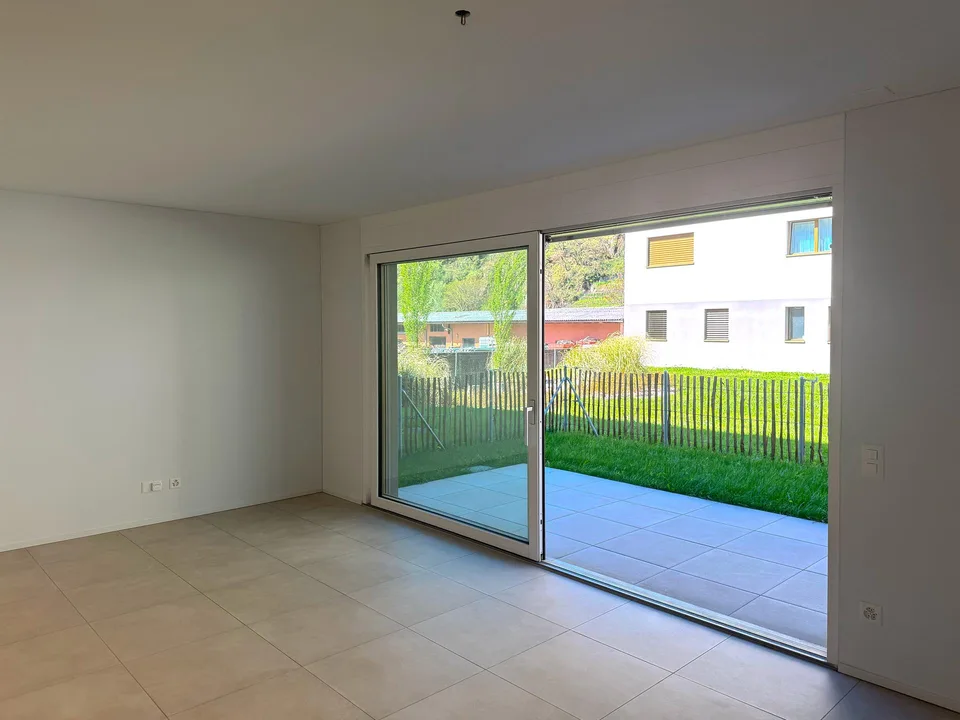 Appartamento moderno 2.5 locali con giardino privato a Lumino (TI)