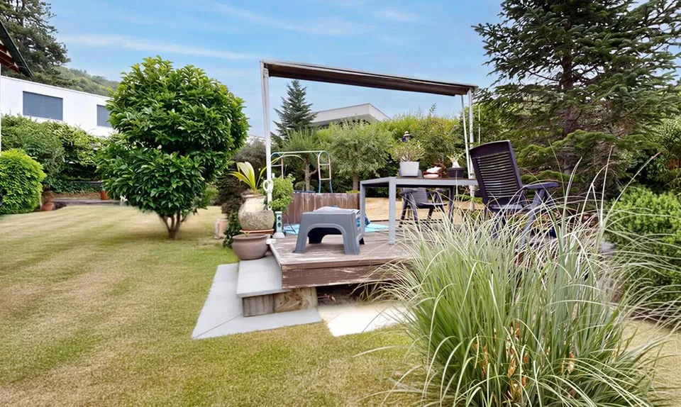 Freistehendes Einfamilienhaus mit herrlichem Garten und Grünsicht – Foto 10 von 11