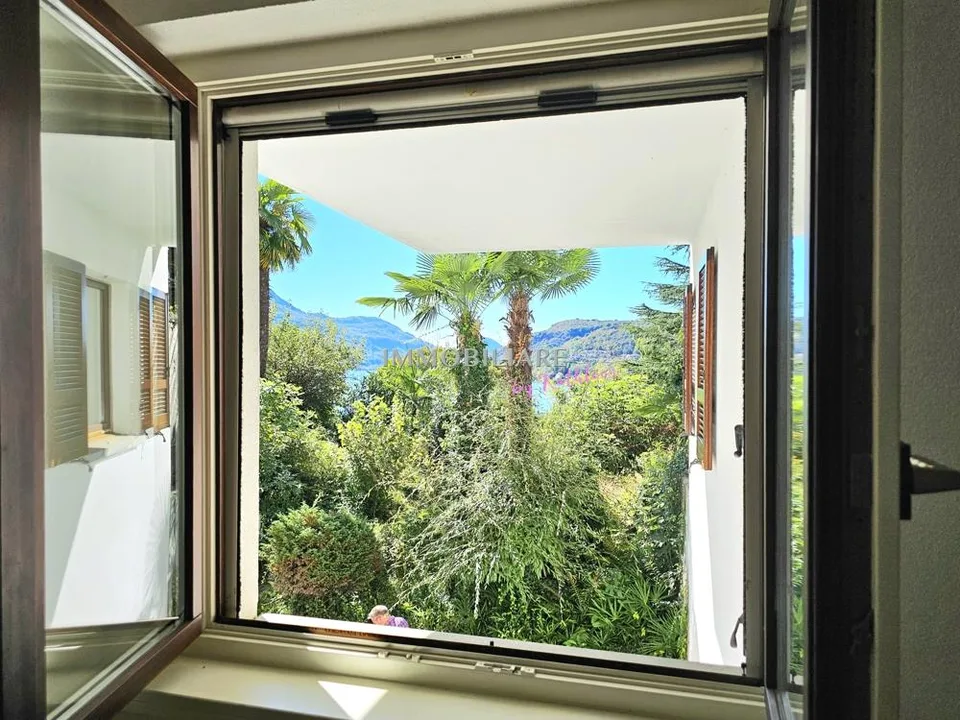 Wohnung in Villa: Erdgeschoss mit Garten, Terrasse und Seeblick